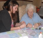 Pictured is Resident Mary Ann Ross working with SUNY Student at a recent Wednesday afternoon visit.