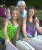 Pictured are: volunteer Claudia Chetney (right), resident Priscilla Brown and volunteer Abby Douglas at a recent outing to the Summer Concert Series at Brietbeck Park.